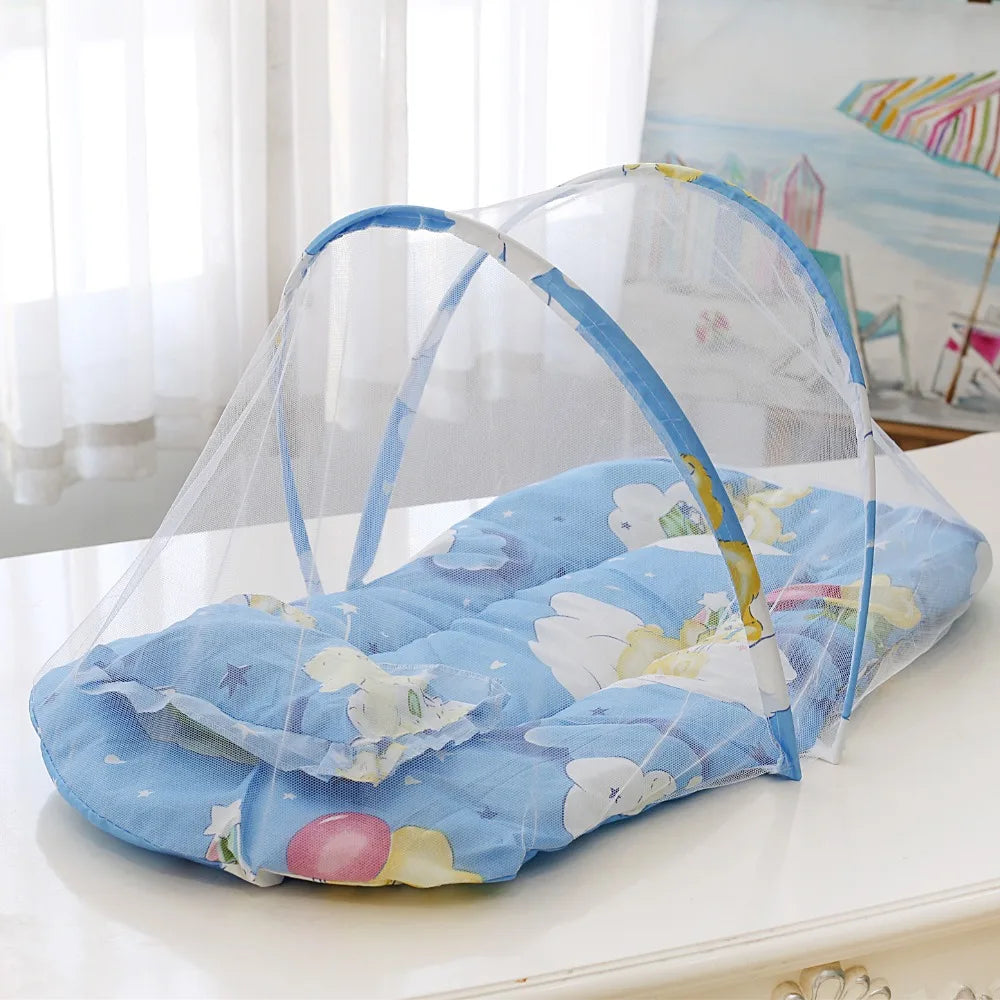 SnuggleShield™ Portable Baby Crib with Mosquito Net & Cushions